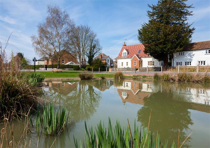 Newmarket view of pond and homes