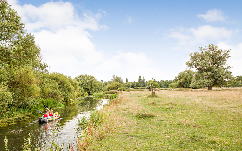 People in canoe on river